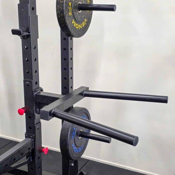 Dip bar attachment mounted on power rack for strength training